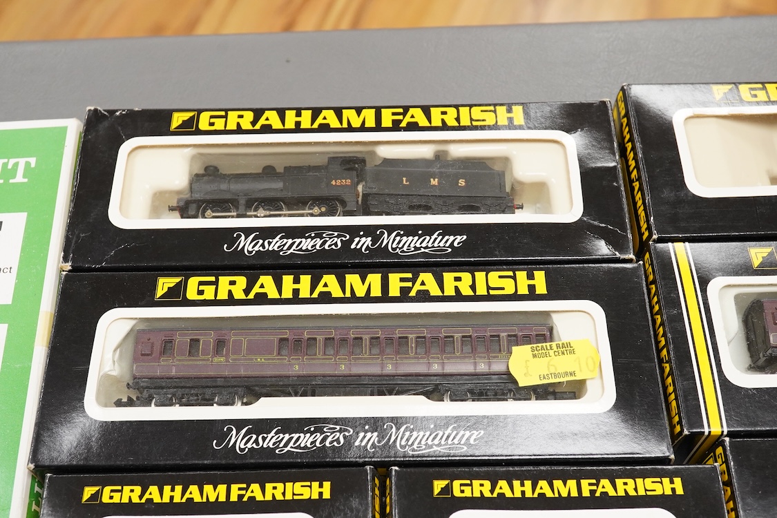 Thirteen N gauge railway by Graham Farish, etc., including two locomotives; a BR Class 4 0-6-0 tender locomotive, 4232, and an LMS 0-6-0T locomotive, 16389, together with two bogie coaches, eight freight wagons, and a Pe